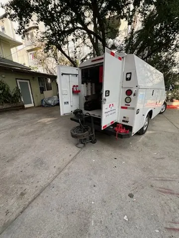 Magnet Plumbing service vehicle on-site for Grease Trap Cleaning in Mahaffey